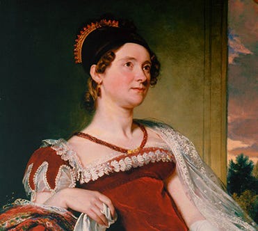 Louisa Adams in a red empire-waist gown with a black cap over her brown curls.