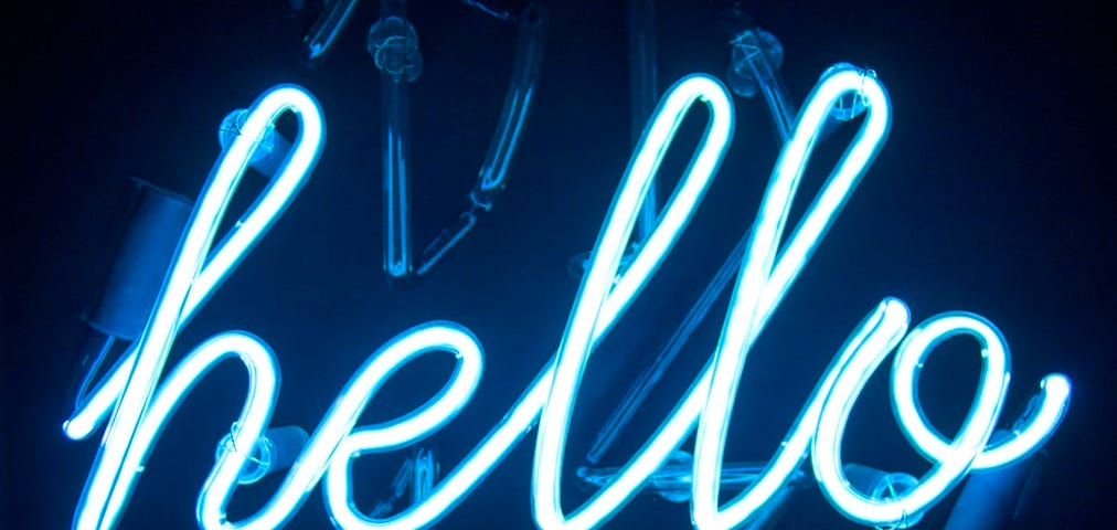 A neon blue “hello” sign.