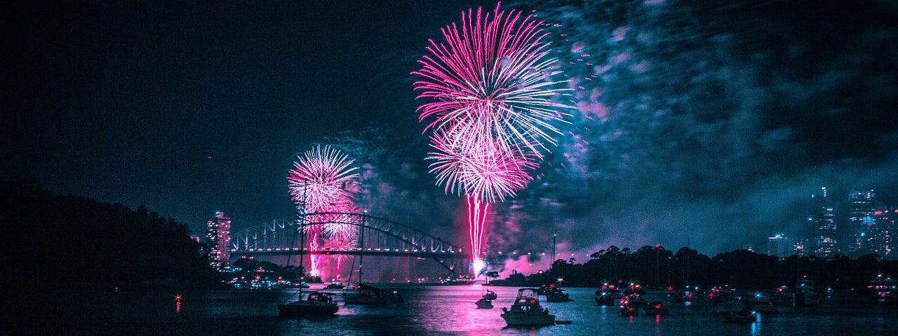 A beautiful pink and blue fireworks show.