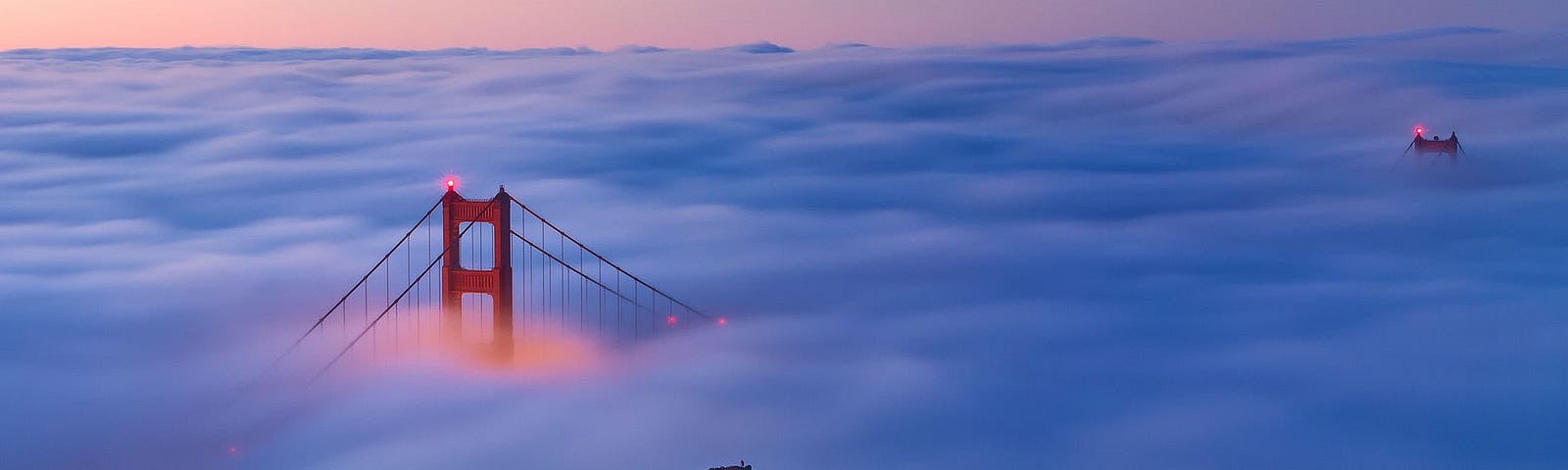An image of the Golden Gate Bridge shrouded in fog