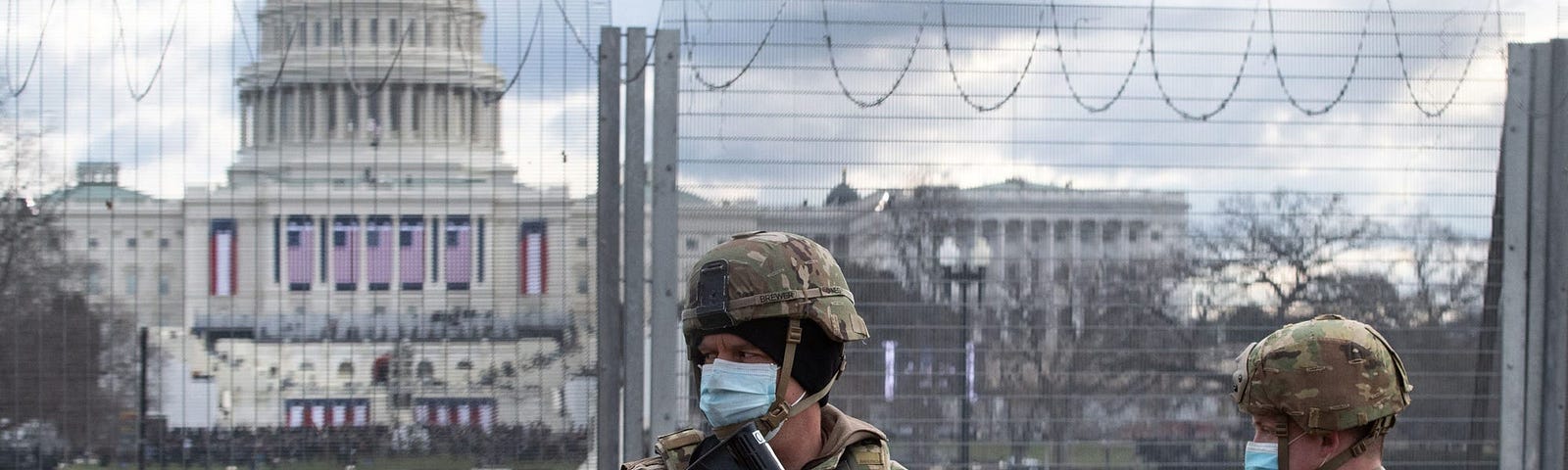 US National Guard troops patrol the vicinity of the US Capitol hours before the Inauguration of US President-Elect Joe Biden.