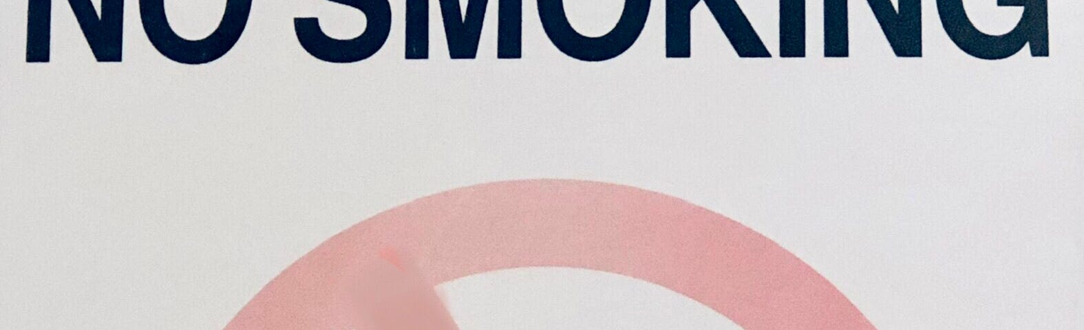 No smoking sign — a cigarette in a red circle with a line through it