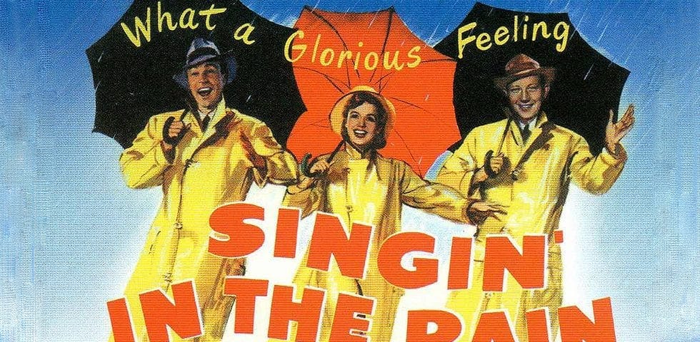 singing in the rain poster with the three friends in raincoats with umbrellas
