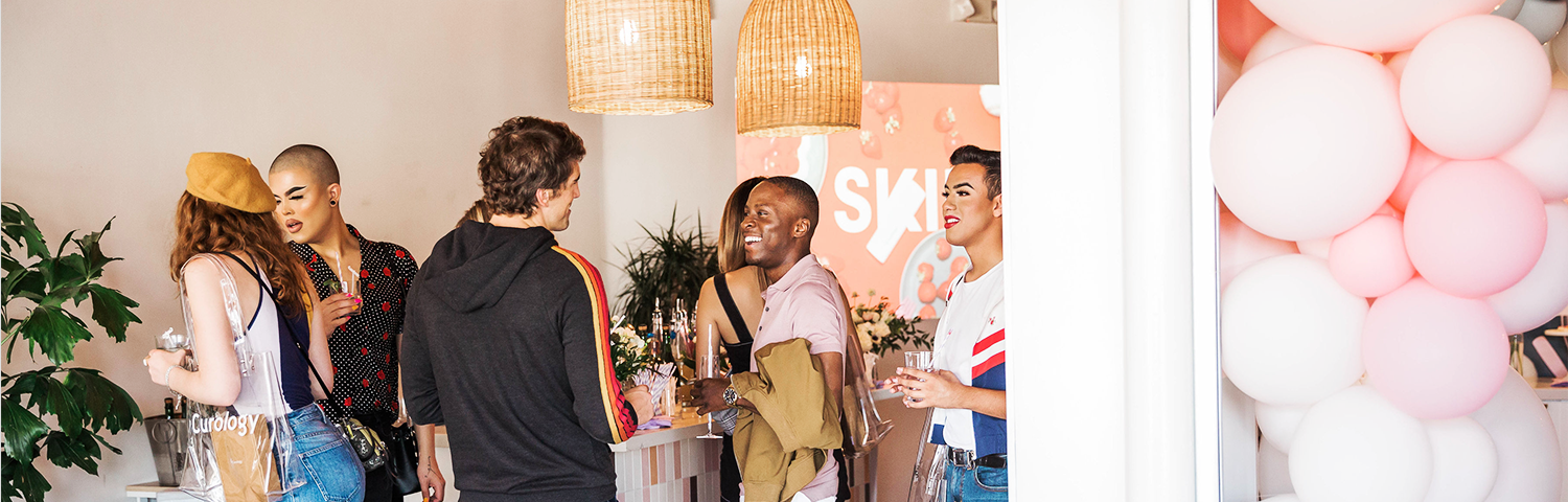 Curology CEO/co-founder David Lortscher chatting with guests at the Curology set launch party