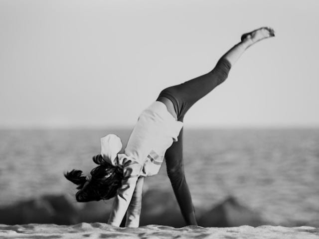 Young girl in the midst of a handstand