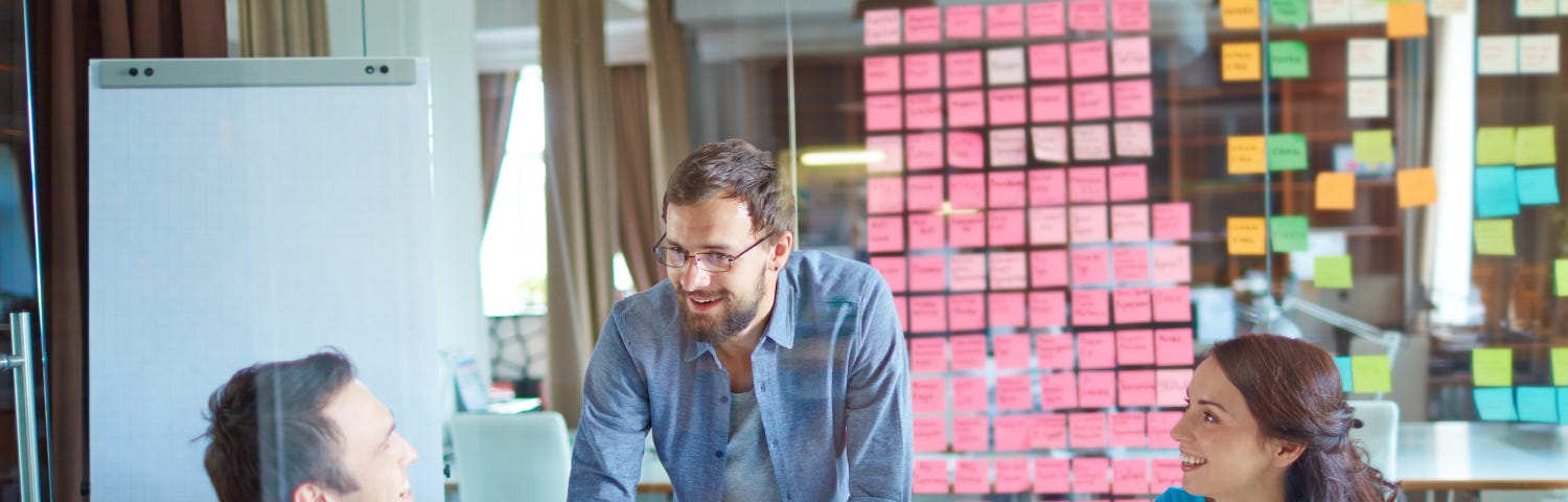 A group of people running a workshop together