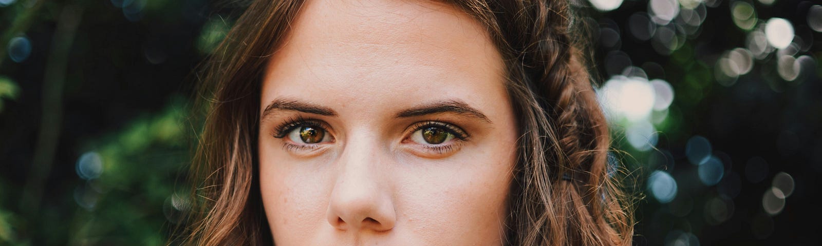 A young lady looking stern and angry.