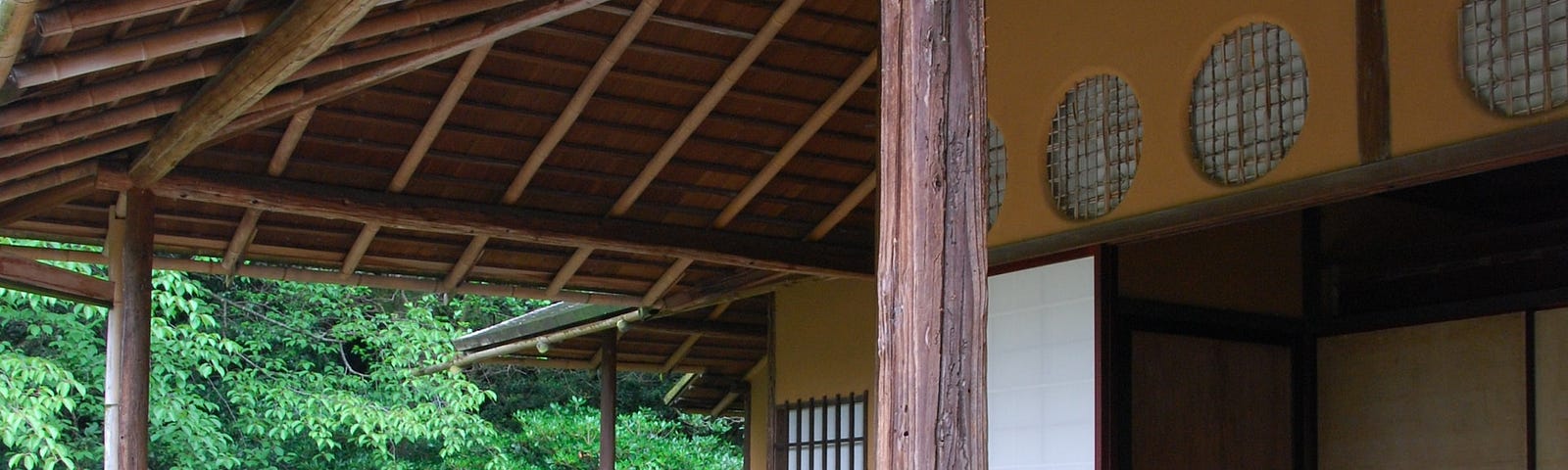 The wooden front porch of a traditional Japanese home.
