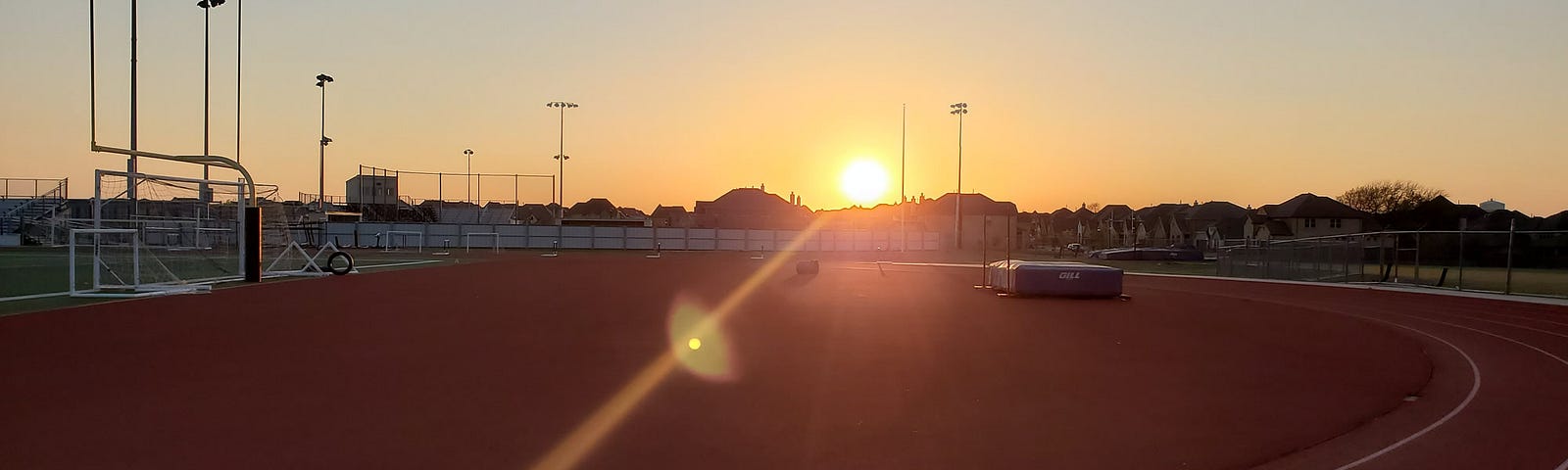 Texas middle school track during sunset