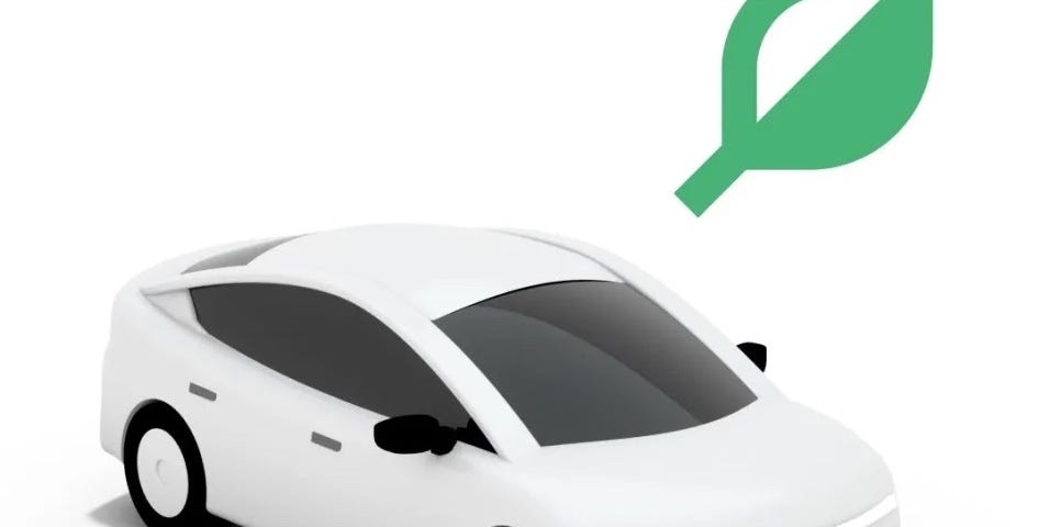 IMAGE: A white drawing of a car with a green leaf