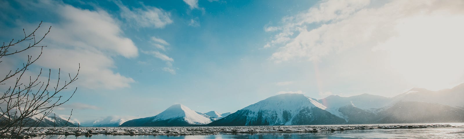 Snowcapped mountains and a lake and other pretty stuff in Alaska. The Only Thing That Has Changed in 500 Years by Jim Latham