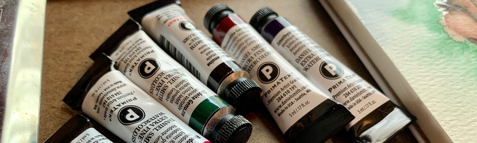 Tubes of watercolor paint by maker Daniel Smith