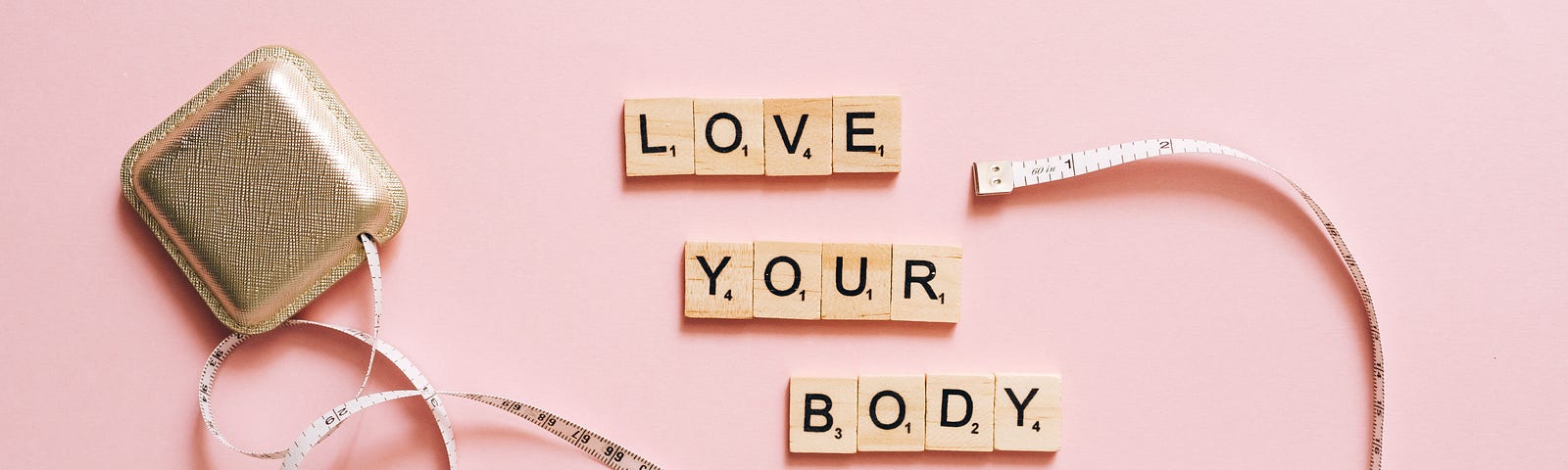 Tape measure and words “Love your body”