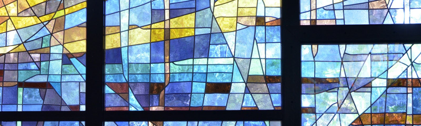 Closeup of stained glass abstract landscape