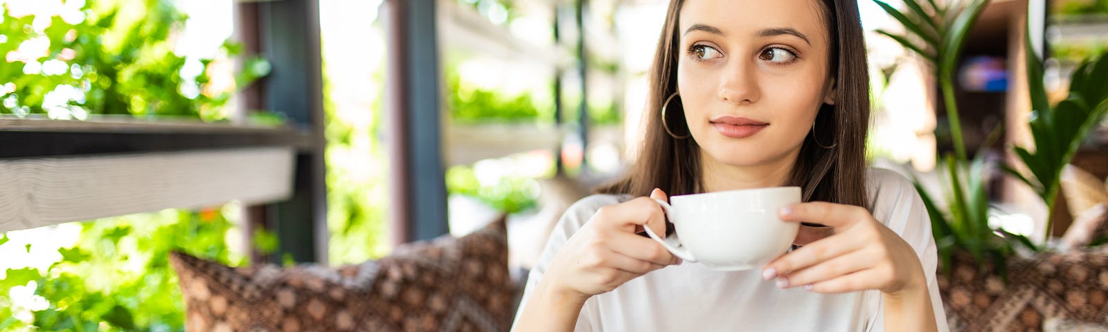 Woman waiting in coffee house