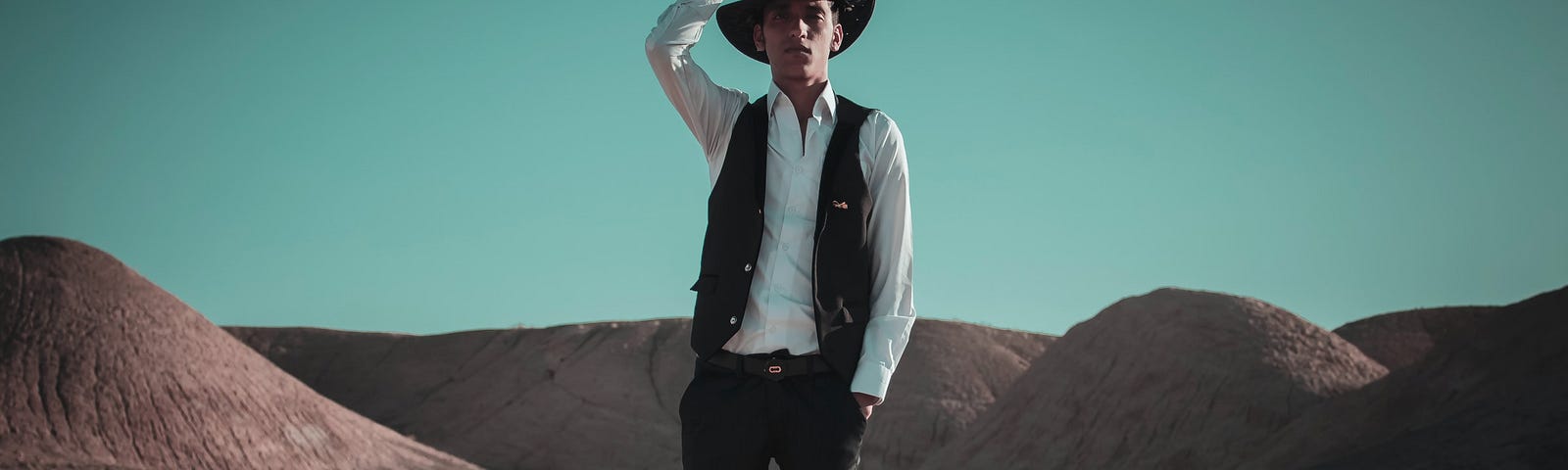 A cowboy in the desert.