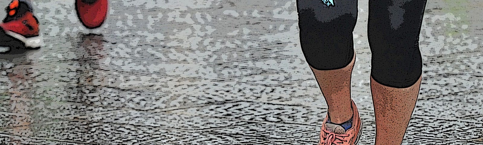 Pair of feet running along a cobbled street