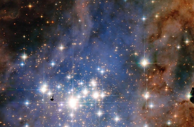 This NASA/ESA Hubble Space Telescope image features the star cluster Trumpler 14. This cluster houses some of the most brightest stars in our entire galaxy