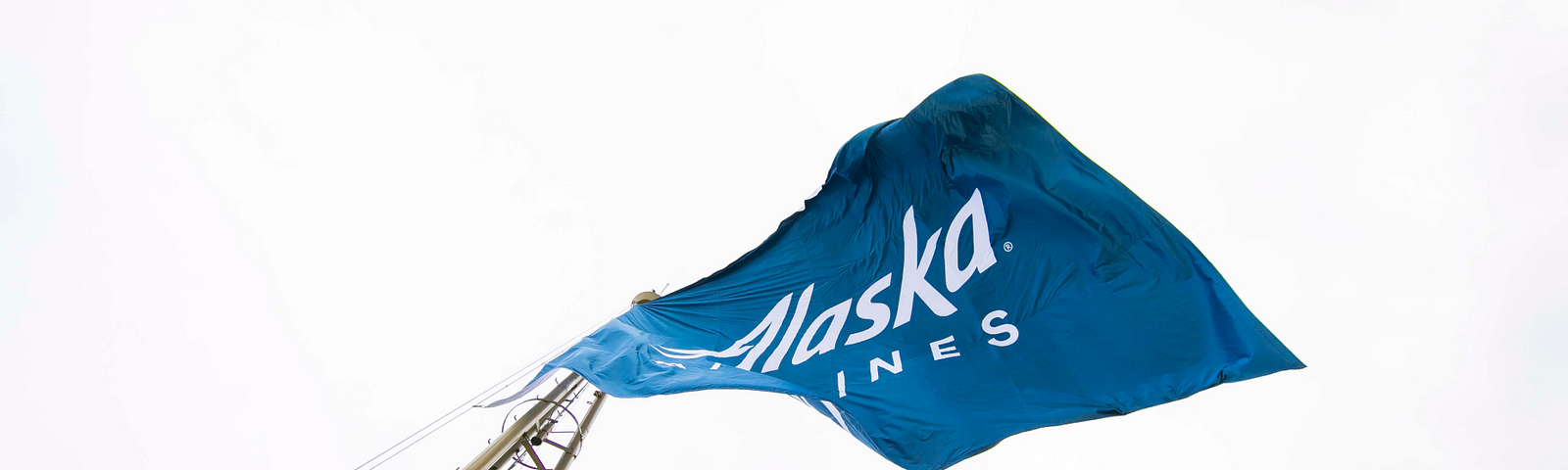An Alaska Airlines flag waving on top of the space needle. Credit: Ingrid Barrentine