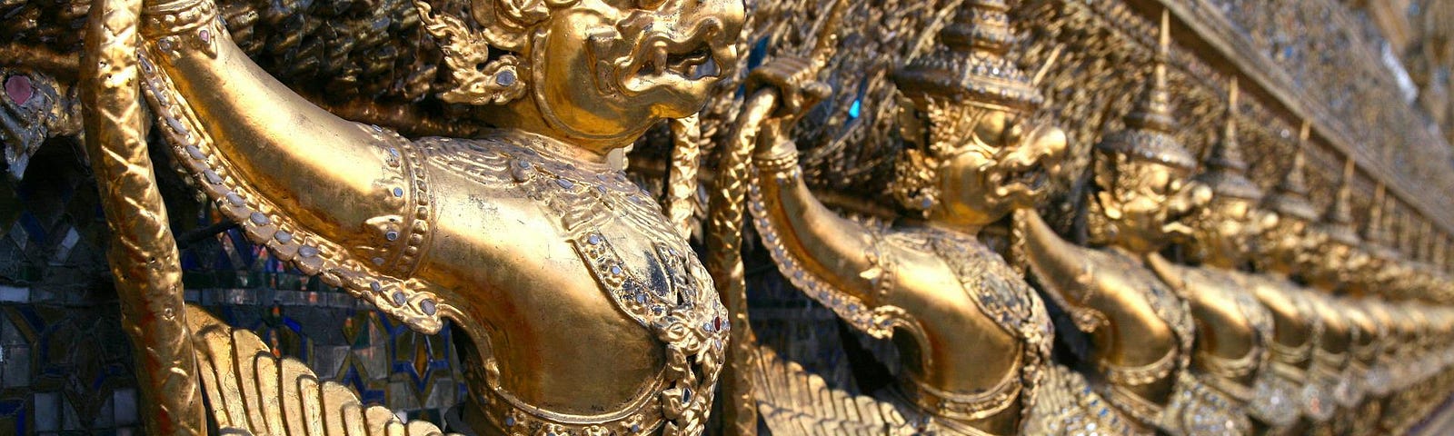 A row of brass demons all exactly the same symbolizing the effects of repurposing your content online.