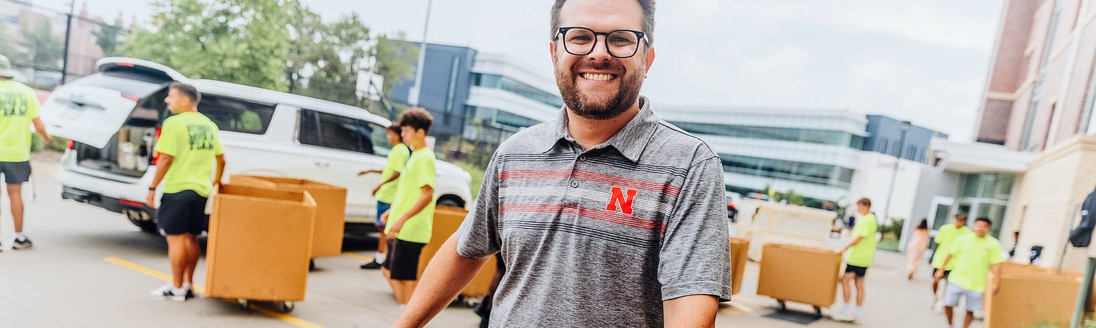 Matt pushes a box during move-in