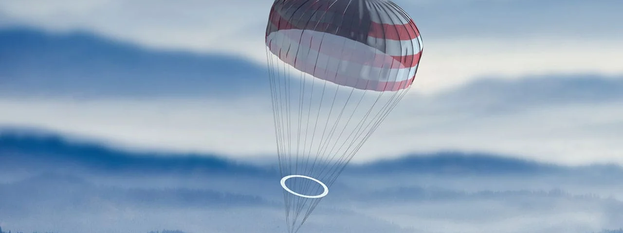 An airplane atteched to a parachute.