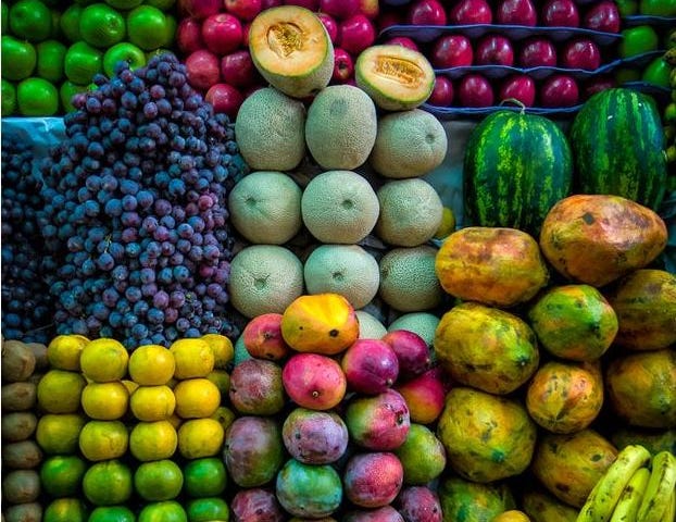 Fruits in a store groupped by their type