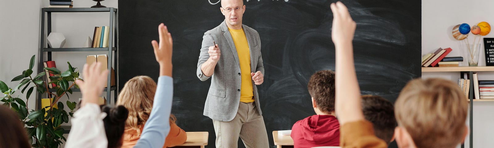 Teacher Teaching His Students