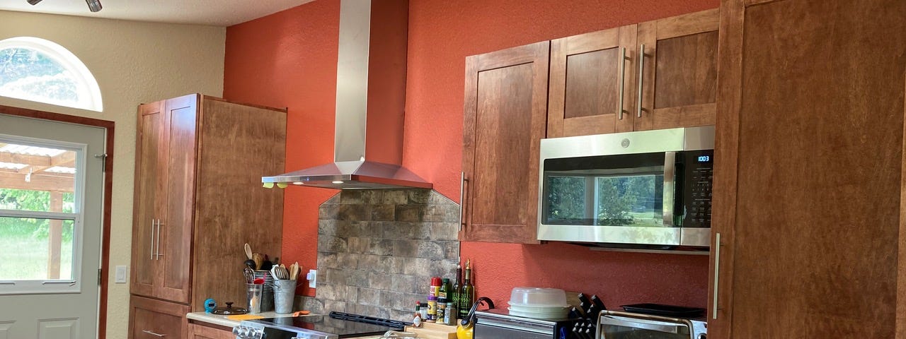 Our remodeled kitchen with wood cabinets