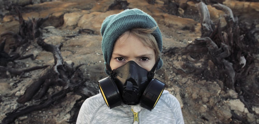 Child wearing a protective mask