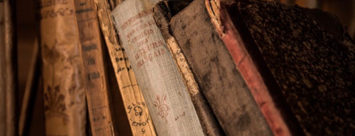 A shelf of old books.