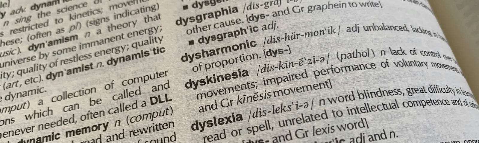 A dictionary open to the page with the definition of dyslexia.