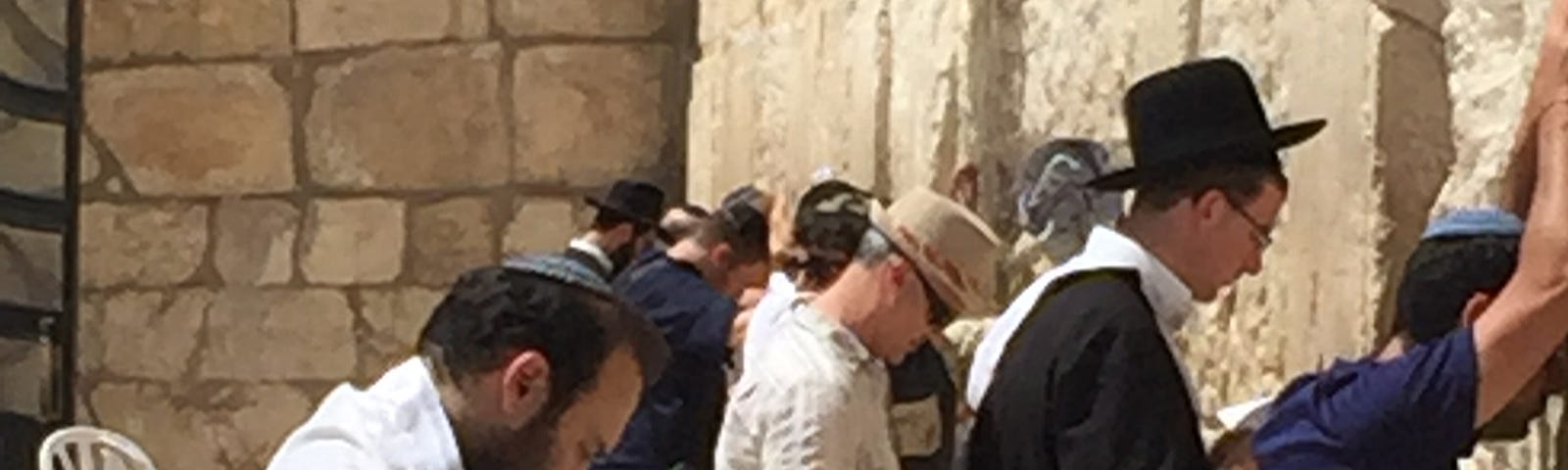 People praying at the Western Wall in Jerusalem.