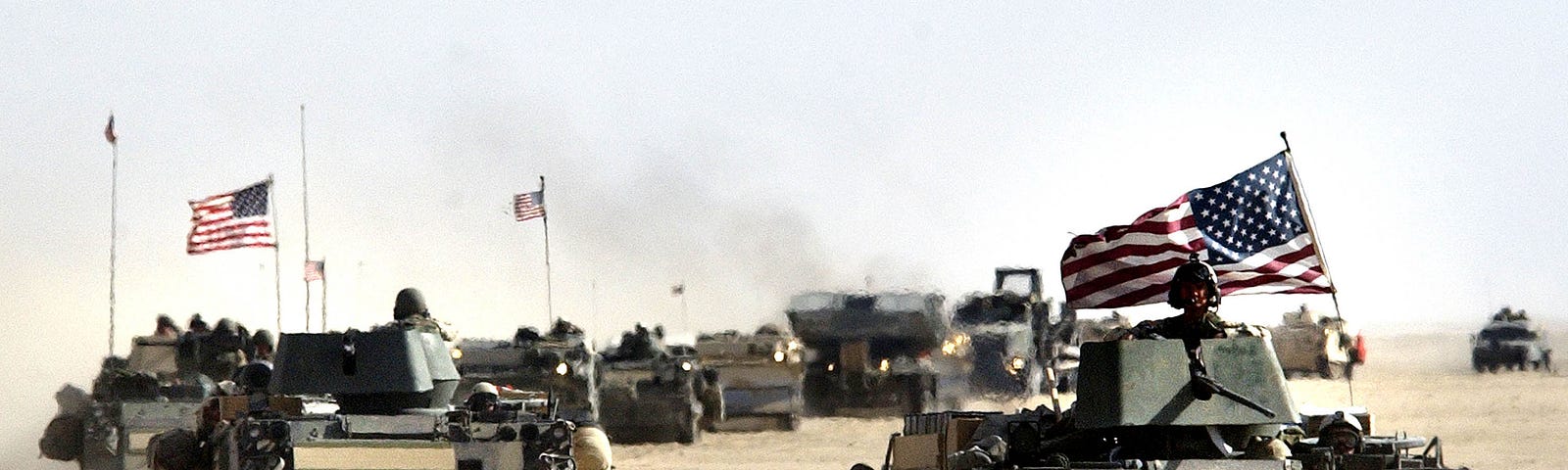 U.S. Army 11th Engineers move into position ahead of a possible military strike near Kuwait-Iraq border on March 18, 2003.