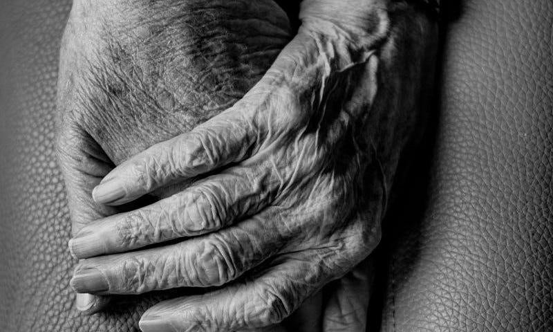 Elderly hands in black and white
