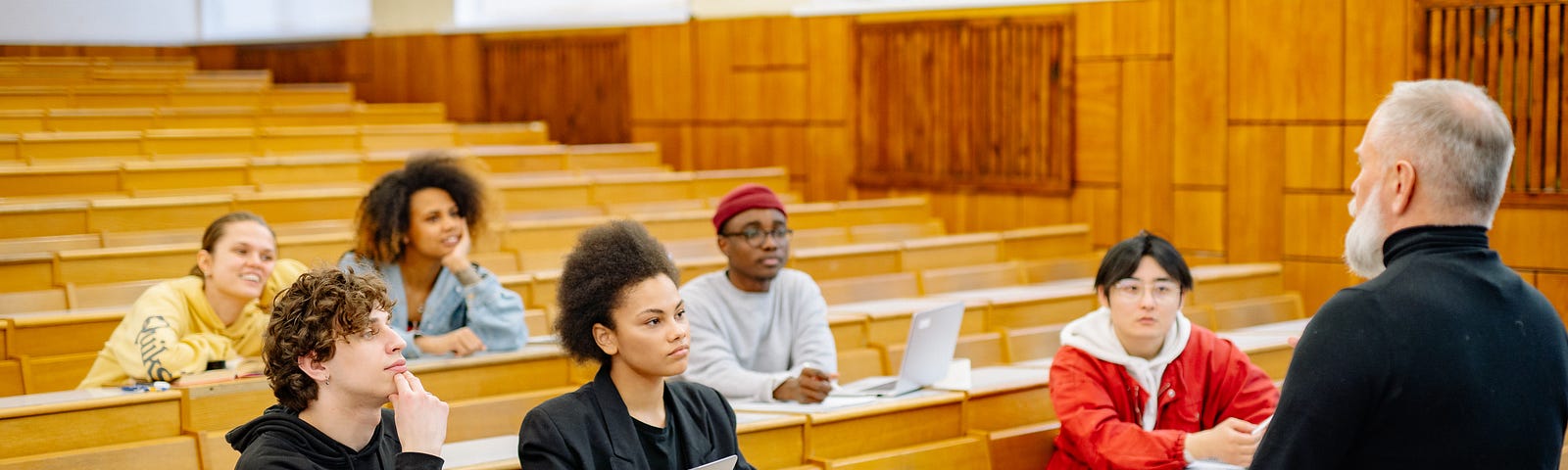 Professor Standing in Front of his Students