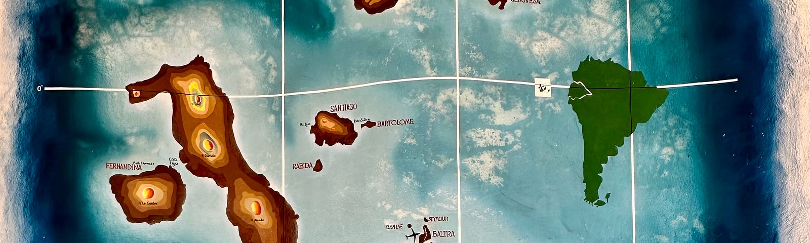A painting of Islands of the Galápagos, from a mural at Casa Playa Mann Hotel in San Cristobal. Not to scale. Photo by Author.