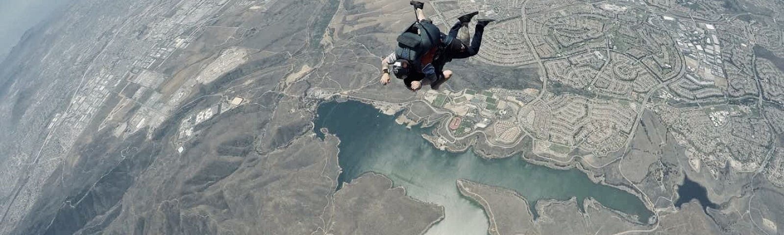 A parachutist floating in air