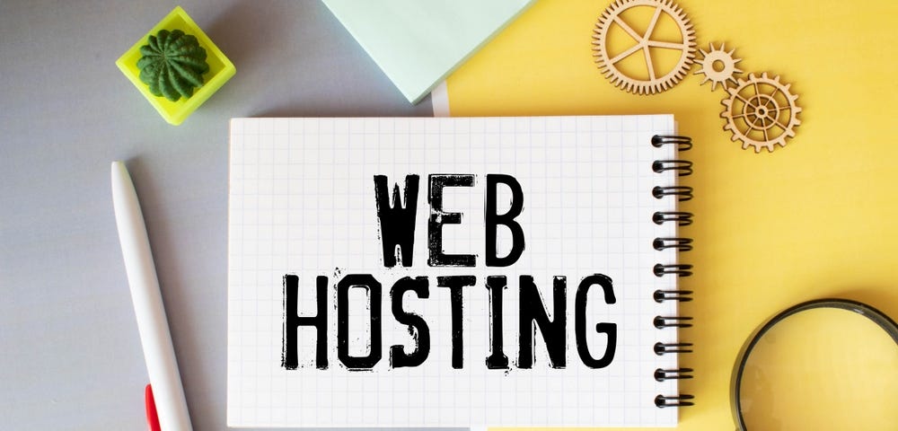 Web hosting written on a notebook