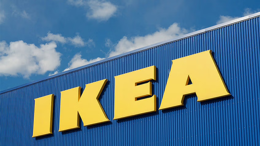 Signage on the outside of an IKEA shines bright during a sunny day.