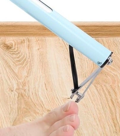A picture of an extender pole with toenail clippers attached.
