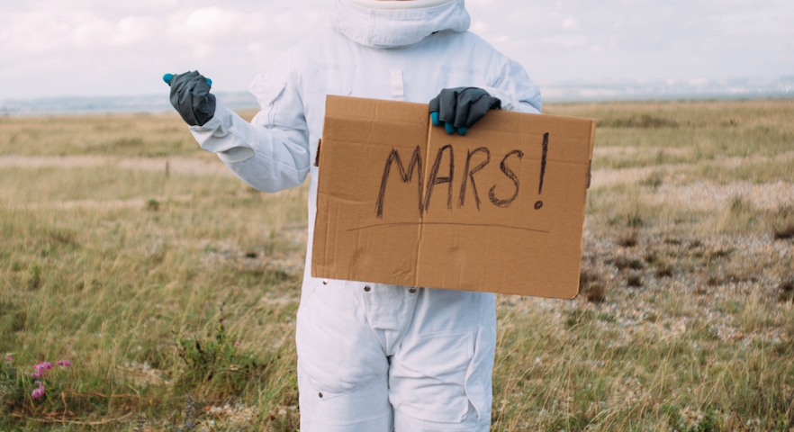 photo of man hitchhiking to Mars by T Leish, Pexels