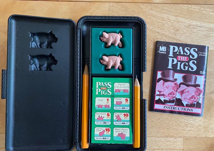 Pass the Pigs game packing
