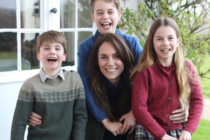 Photo of British royal family posing with Kate Middleton. Satire. Humor. England. King Charles. Mother’s Day.