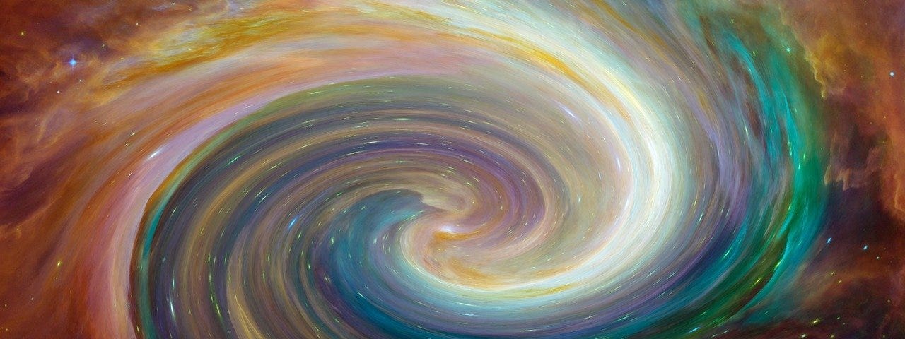 A swirling vortex of mixed colours.