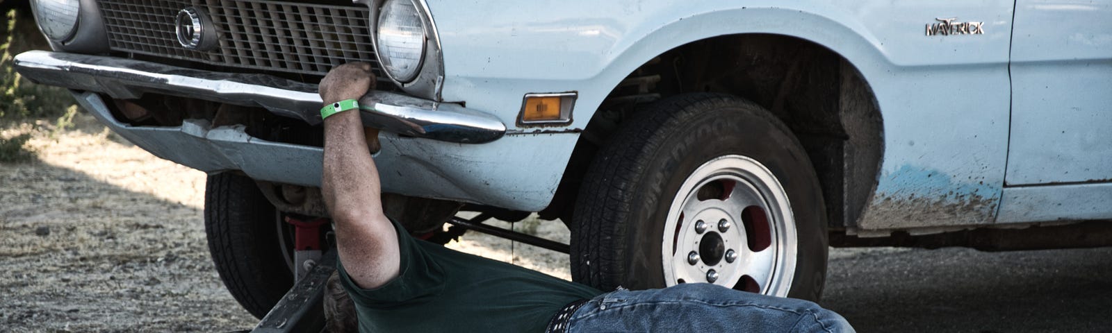 Man fixing a car