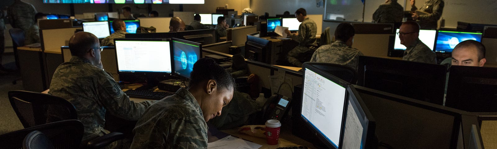 Cyber warfare operators monitor cyber attacks at Warfield Air National Guard Base, Middle River, MD, December 2, 2017. Photo by J.M. Eddins Jr./U.S. Air Force