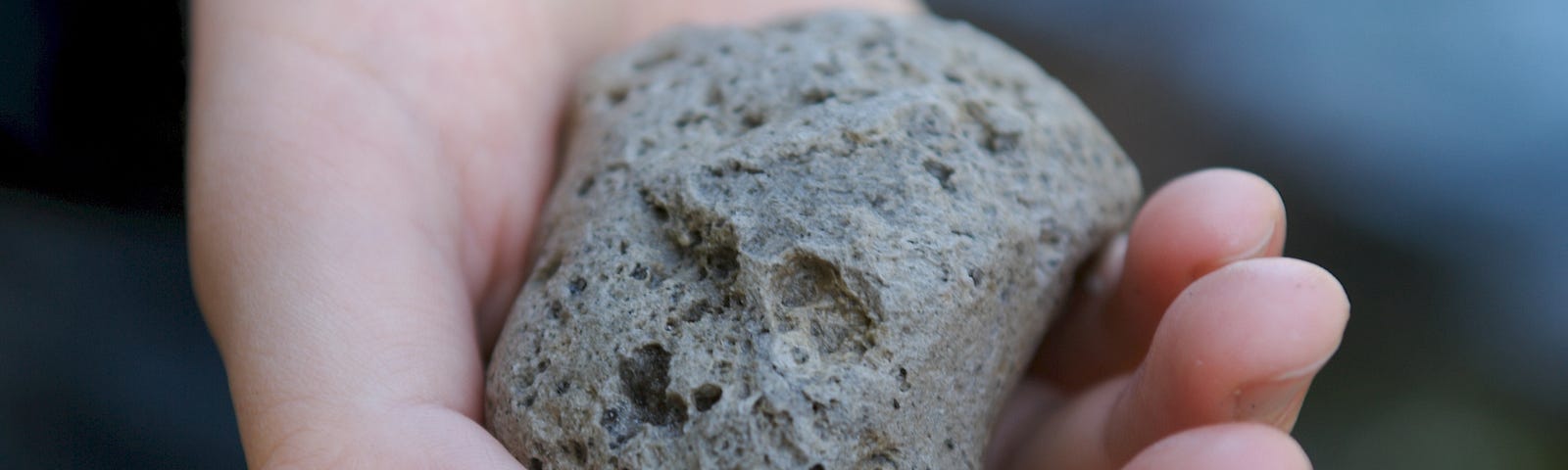 hand holding a pumice stone