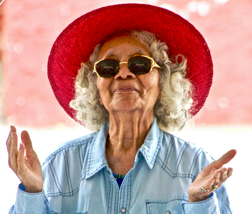 woman-wearing-red-hat-and-sunglasses