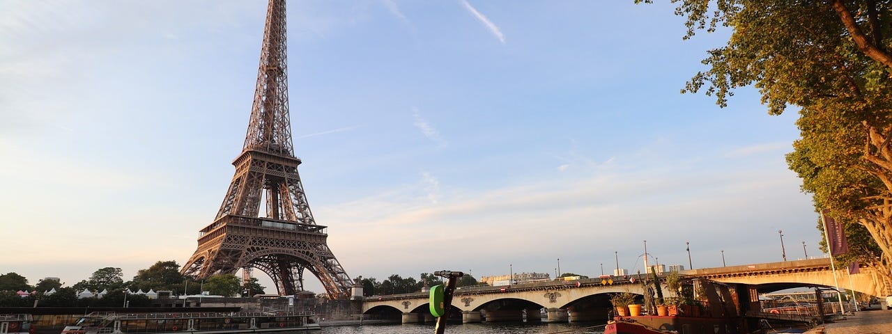 IMAGE: A shared scooter in front of the Eiffel Tower in Paris